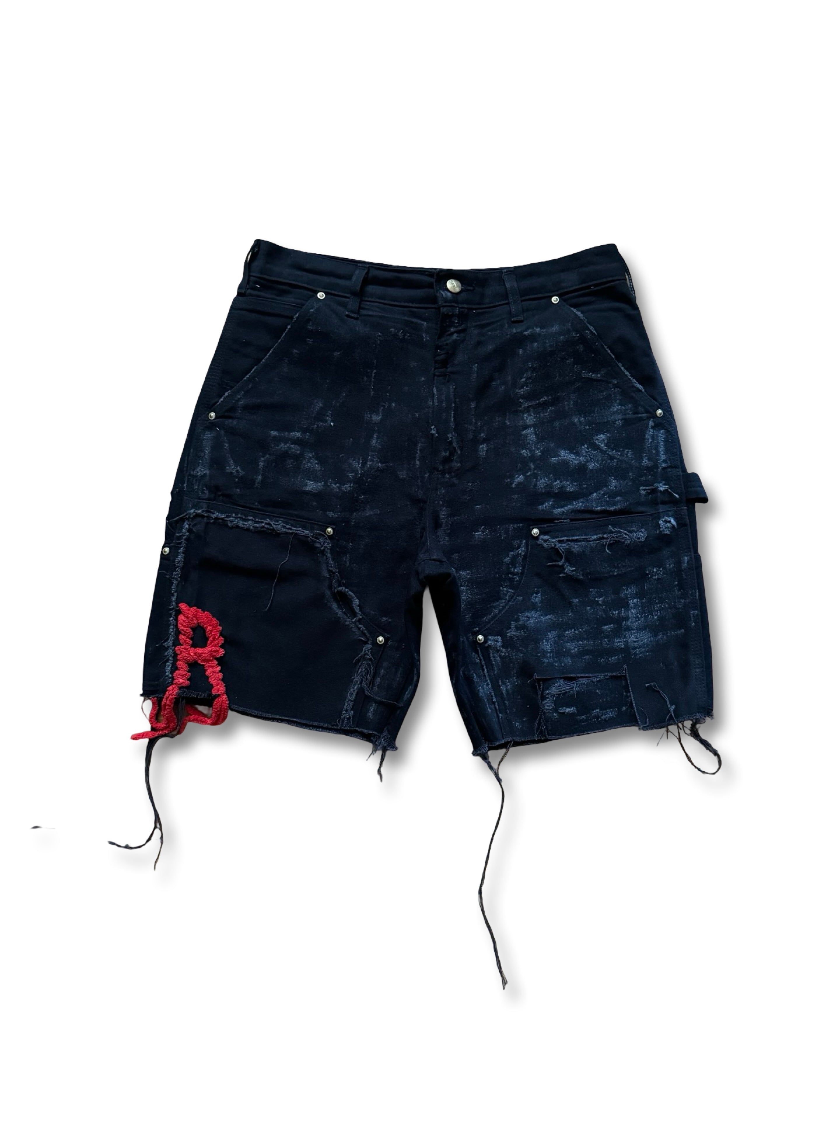 Double knee distressed foil R stitched short.