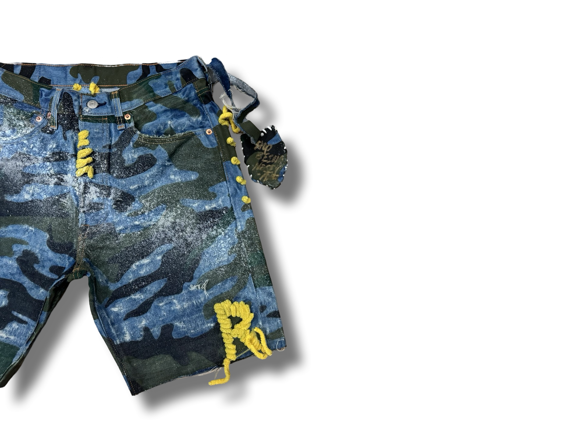 Distressed vintage camo printed denim stash pocket shorts